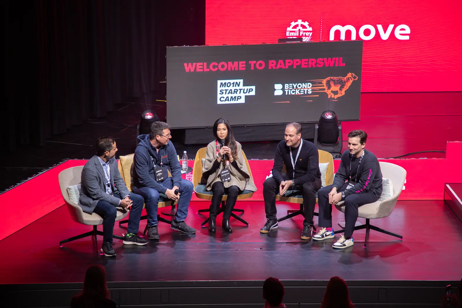 The M01N pitch jury of investors and founders on stage during the Q&A